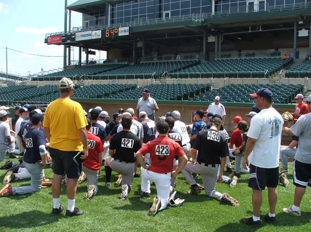 Joe Barth Jr., the Hit Doctor speaking to players at Arsenal tryouts at Campbell Field
